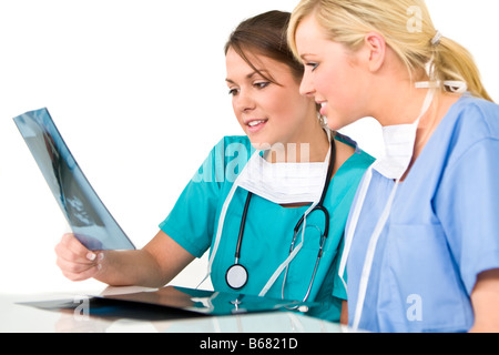 Two female doctors examining an X ray Stock Photo