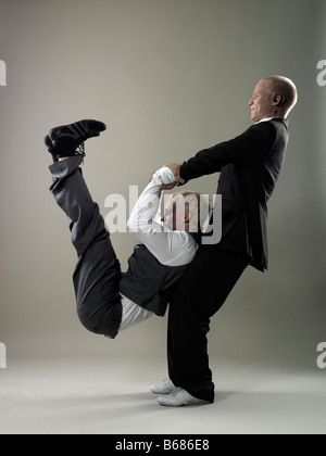 Men Balancing Strength and determination. a man balancing on an exercise ball lifting ...