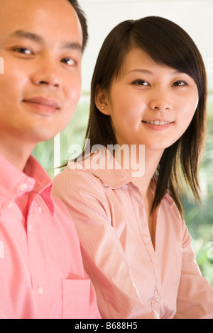 Portrait of two office workers smiling Stock Photo