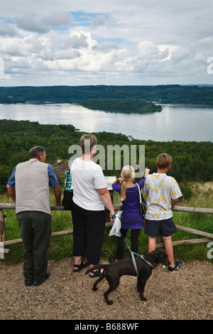 Family looking at the view of Lake Julsø from Himmelbjerget, Jutland, Denmark Stock Photo