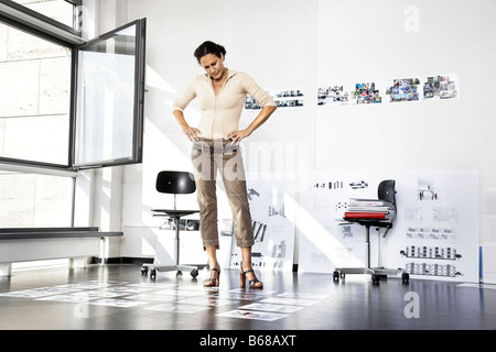 Woman in architect office, working Stock Photo