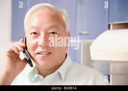 Close-up of a mature man talking on a mobile phone Stock Photo