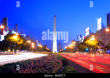 view of 9 de Julio Avenue, with Obelisco Monument, at dusk, with car lights lines. Long exposure Buenos Aires, Argentina Stock Photo