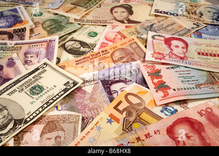 selection of world currency banknotes including US Dollar UK Pounds Indian Rupee Chinese Renminbi Stock Photo