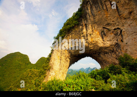 Natural arch formed at a hill, Moon Hill, Yangshuo, Guangxi Province, China Stock Photo