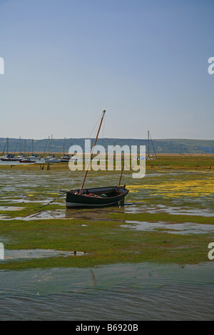 Assorted yachts moored in Keyhaven harbour Hampshire England UK Stock Photo