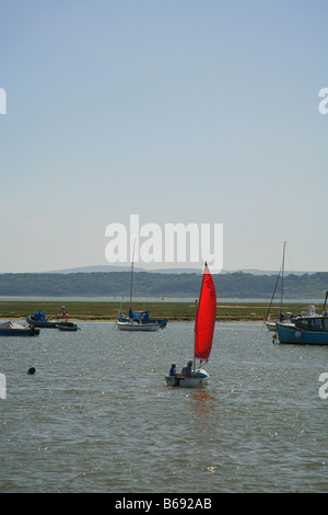 Assorted yachts and dingies in Keyhaven harbour Hampshire England UK Stock Photo