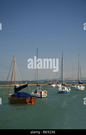Assorted yachts in Keyhaven harbour Hampshire England UK Stock Photo