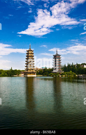 Pagodas at lakeside, Sun And Moon Pagoda, Banyan Lake, Guilin, Guangxi Province, China Stock Photo