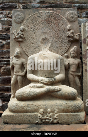 Stupa 1 or Great Stupa : Damaged Buddha statue inside the Stupa premises, Sanchi, Madhya Pradesh, India.