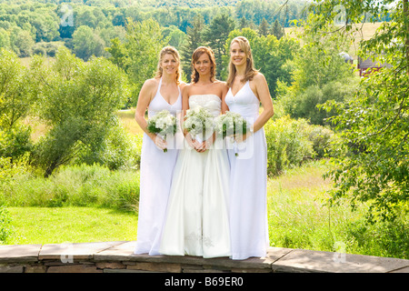 Portrait of women smiling and holding bouquet of flowers, East Meredith, New York State, USA Stock Photo