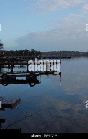 Boat pontoons on swedish inland lake in early winter Stock Photo