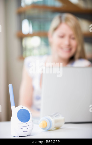 A mother working from home Stock Photo