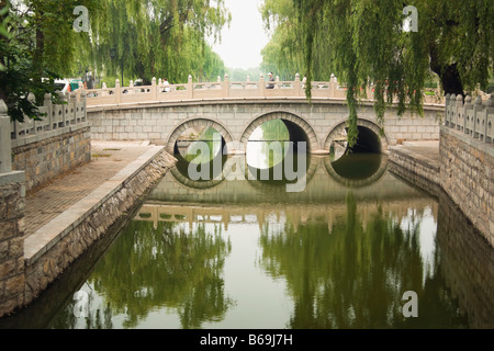 Bridge across a canal, Qufu, Shandong Province, China Stock Photo