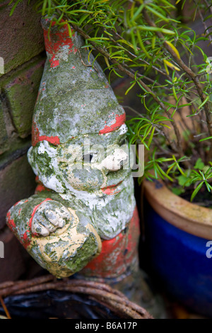 Weather-worn gnome Stock Photo