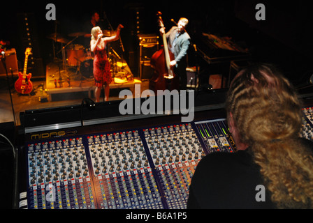 Sound technician at work at rock concert Stock Photo