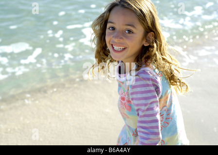 Cute Brazilian Seven Year Old Girl On The Beach Stock Photo - Alamy