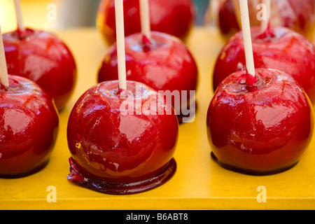 Several red candy apples at a country fair. Stock Photo
