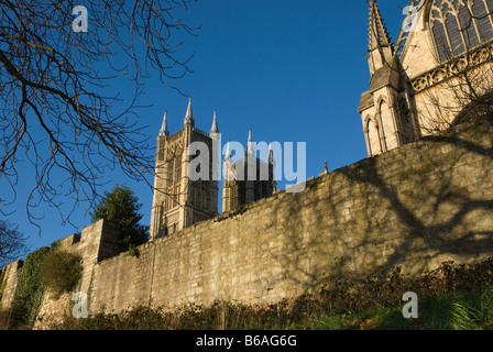 The towers of Lincoln Cathedral, England, viewed from the grounds of the Bishop's Palace. Stock Photo