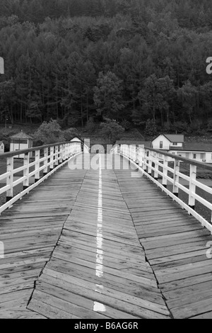 Penmaenpool wooden toll bridge near Dolgellau on the Afon Mawddach Estuary, North Wales, UK Stock Photo
