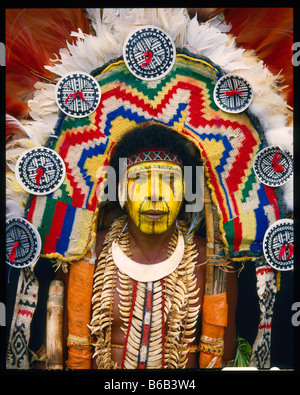 Mekeo man from Central Province of Papua New Guinea in tribal ceremonial dress at a tribal sing sing in Port Moresby in PNG Stock Photo