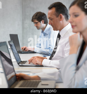 Business executives working in office Stock Photo