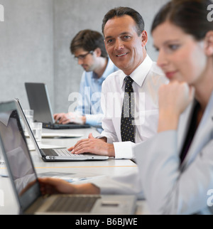 Business executives working in office Stock Photo