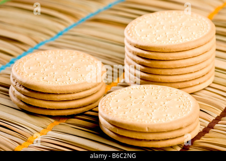 Three piles of biscuits Stock Photo