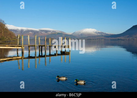 Pier at Brandelhow, Derwent Water, with Blencathra mountain in distance, Lake District National Park, Cumbria, England UK Stock Photo