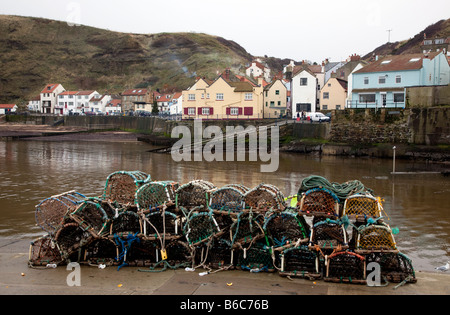 Lobster pots on the harbour in the North Yorkshire village of Staithes England UK Stock Photo