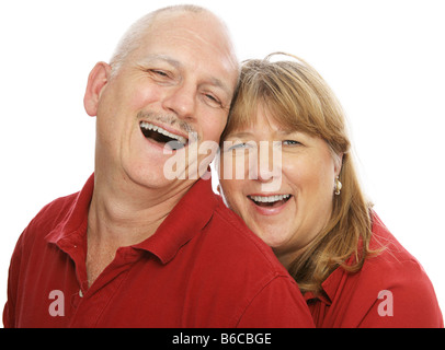 Happy middle aged couple laughing together Isolated on white Stock Photo