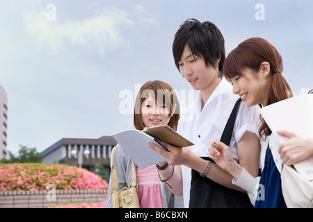 Smiling college students talking in commons Stock Photo - Alamy