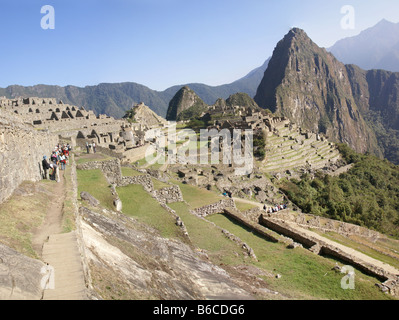 Panorama Huayna Picchu mountain overlooking Inca ruins Machu Picchu Peru South America Stock Photo