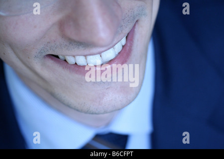 Close-up of businessman smiling Stock Photo
