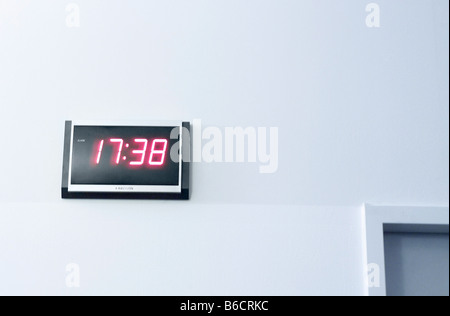 Close-up of digital clock on wall Stock Photo