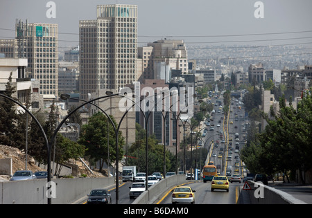 TRAFFIC AL HUSSEIN BIN ALI STREET DOWNTOWN SKYLINE AMMAN JORDAN Stock ...