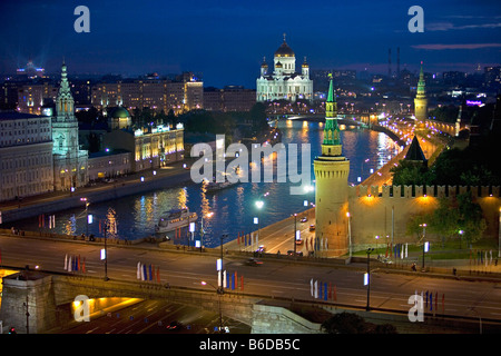 Russia, Moscow, Right: Kremlin. Moskva river with The cathedral of Christ the Savior in background at dusk Stock Photo