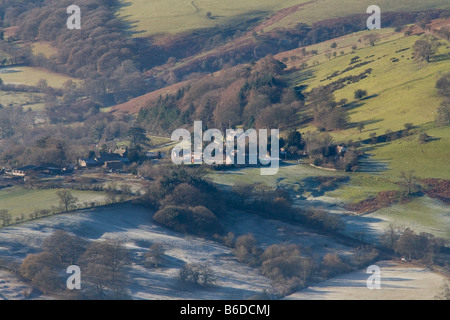 The village of Minton nestling in a frosty Long Mynd, Shropshire Stock Photo