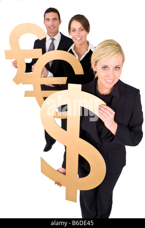 A team of three young executives one man and two women holding currency symbols and looking happy Stock Photo