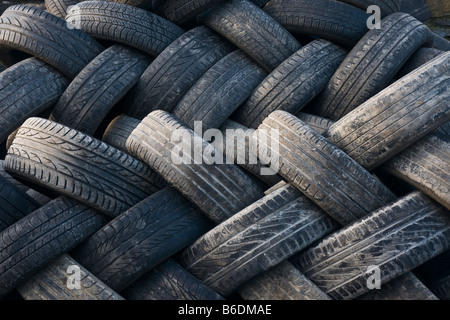 old tyres awaiting disposal or recycling Stock Photo