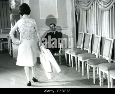 MARC BOHAN French fashion designer at Dior in the late 1950s interviewing prospective models Stock Photo