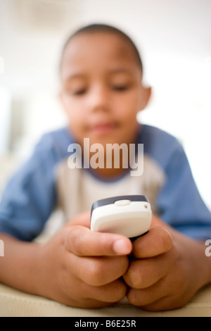 Girl using a mobile telephone. Stock Photo