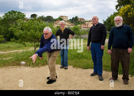 Leading off with a throw, Playing Boules, Nyons,Languedoc-Roussillon, France Stock Photo