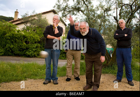 Playing Boules under great scrutiny, Nyons, Languedoc-Roussillon, France Stock Photo
