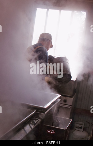 Traditional making of maple syrup by boiling down sap in an evaporator Ephrata New York Adirondacks Stock Photo