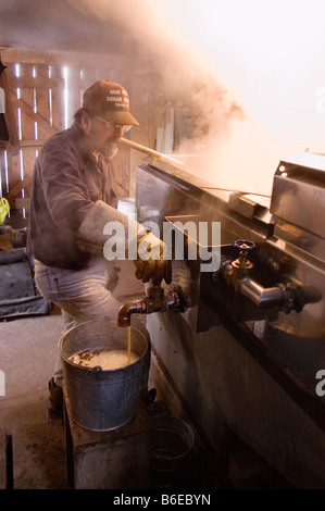 Traditional making of maple syrup by boiling down sap in an evaporator Ephrata New York Adirondacks Stock Photo