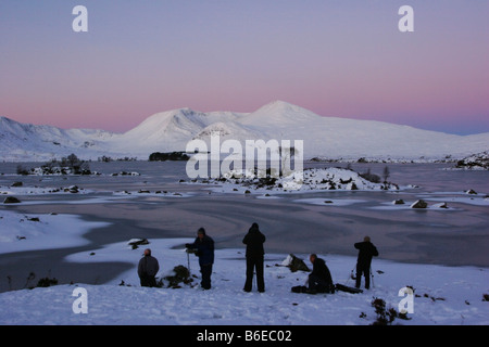 A group of photographers waiting for sunrise at Black Mount Stock Photo