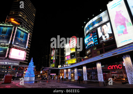 Toronto Dundas Square Billboards and Christmas lights at night Stock Photo