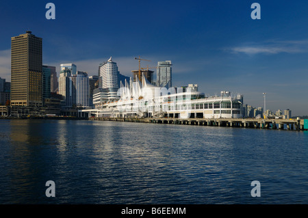 Canada Place sails floating on pilons and Vancouver waterfront with downtown high rise towers from Burrard Inlet harbour British Columbia Canada Stock Photo
