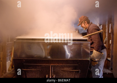 Traditional making of maple syrup by boiling down sap in an evaporator Ephrata New York Adirondacks Stock Photo